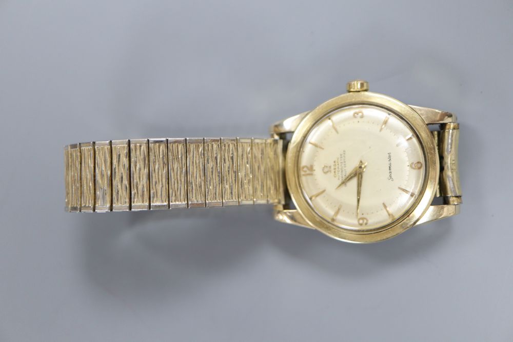 A gentlemans steel and gold plated Omega Automatic Chronometer Seamaster wrist watch, on associated bracelet,